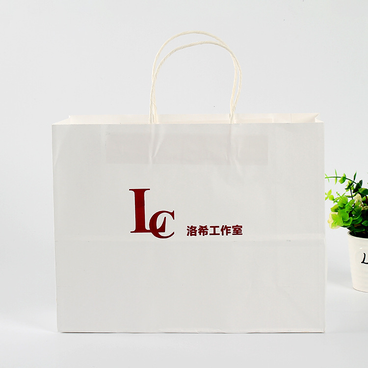 Advertising factory companies to make paper bags for hand-held white cow paper bags to customize shopping with gift bags