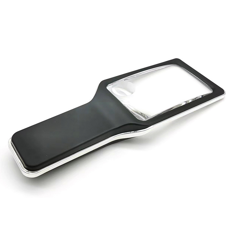 The new square is handheld with magnifying glasses and LEDs.