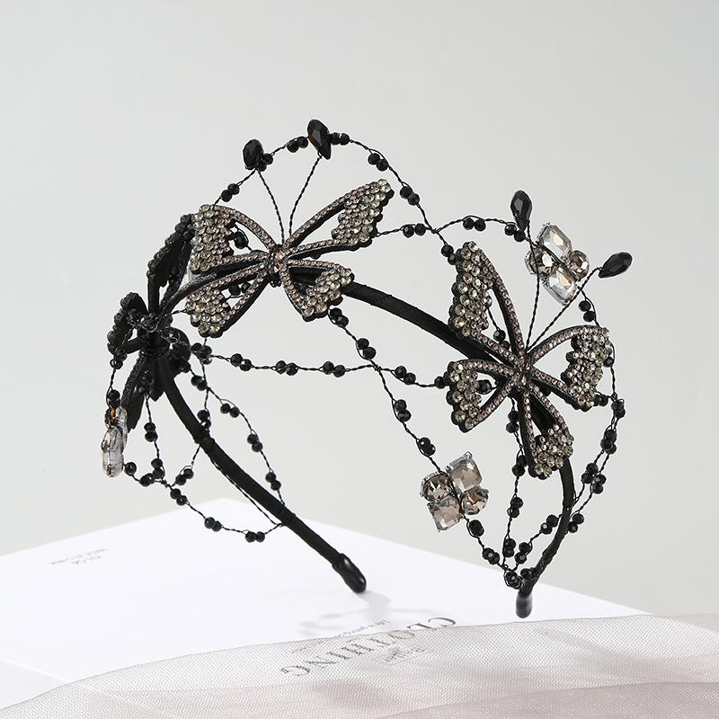 The Korean cross-border crystal butterflies with their finely drilled, hand-made webheads, high-profile bride hair.