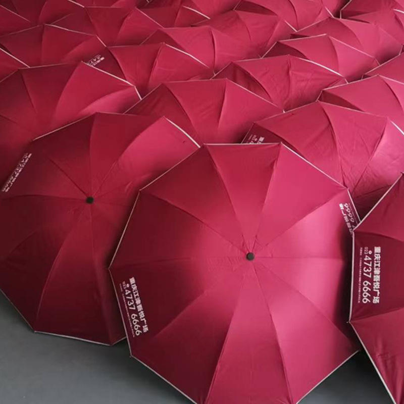 Chongqing umbrella distribution custom-made three-fold advertising campaign for the sunscreen of the sky umbrella's general business gifts for men and women