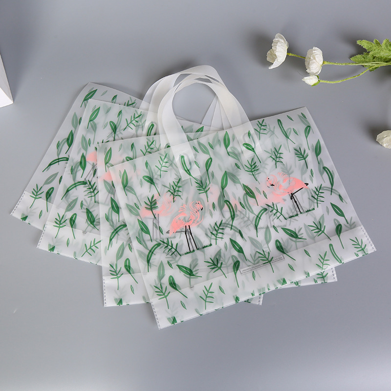 A sand-grained clothing bag, a plastic bag, a girl's gift bag to make a Logo wholesale.
