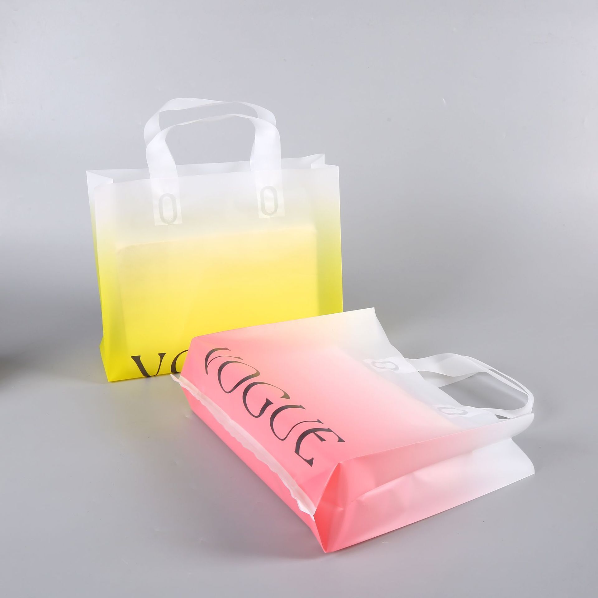 Shopping bags with transparent gradual change plastic bags and cosmetics store bags with logo bags