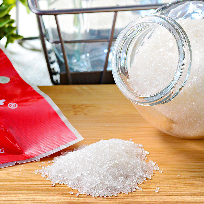 Một nhóm bán đường trắng 454g mua một hộp đường nhỏ cho đường đường.