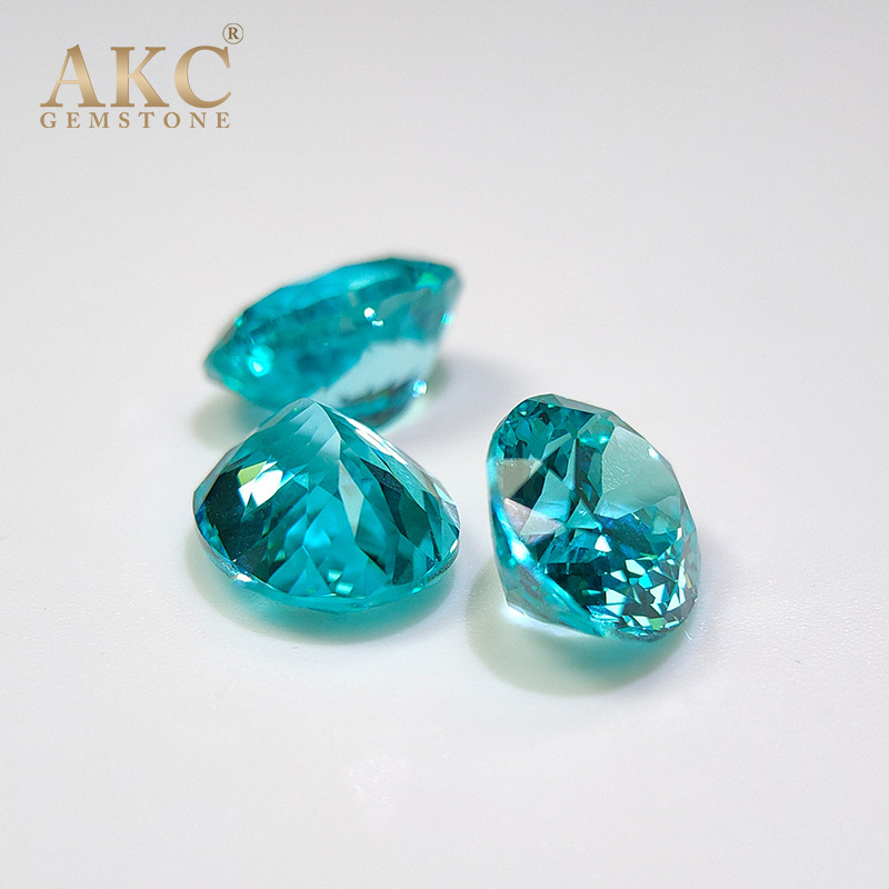 AKC breeds a Palaiba egg-shaped, oval-shaped, blue-lighted, blue-synthetic, electric-supplied stone.