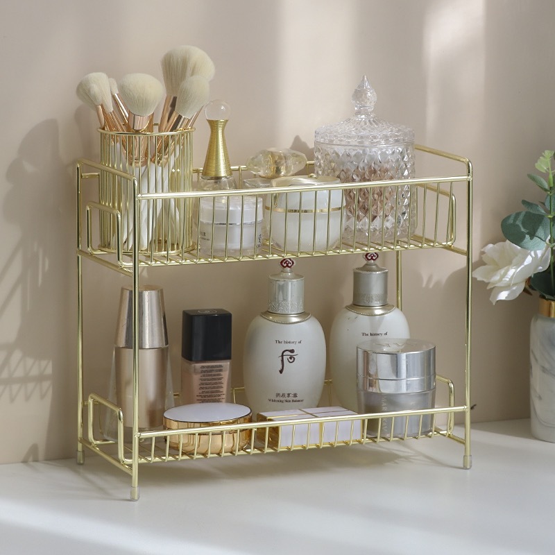 Two-story bathroom floor shelf for gold-coloured northern cosmetics.