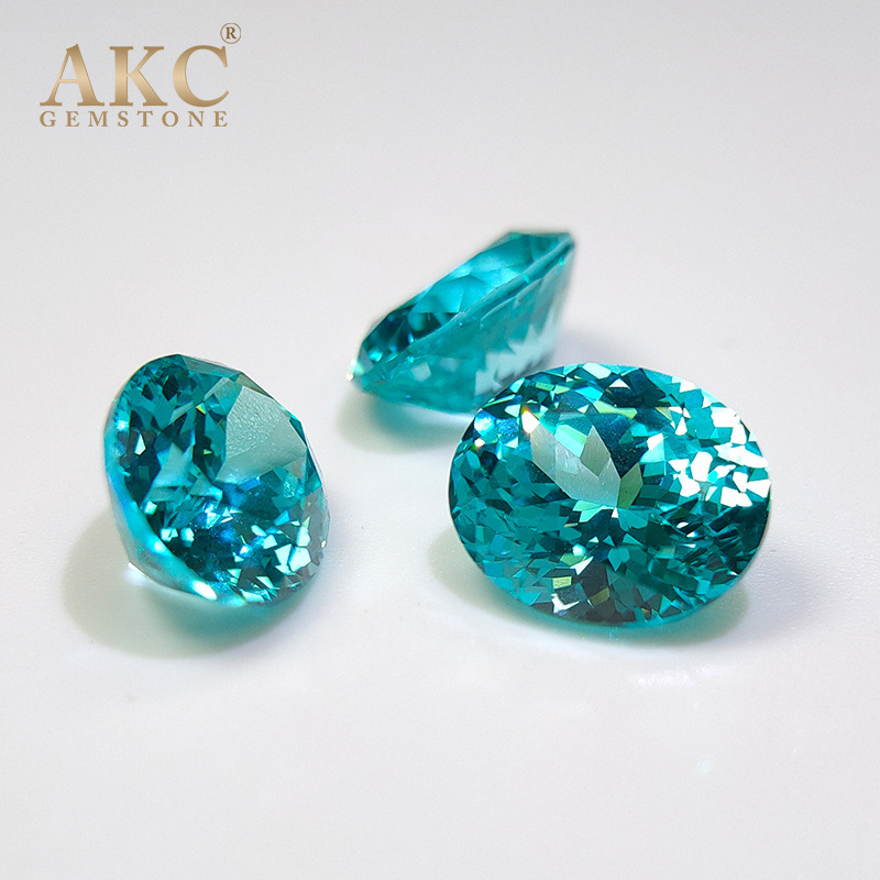 AKC breeds a Palaiba egg-shaped, oval-shaped, blue-lighted, blue-synthetic, electric-supplied stone.