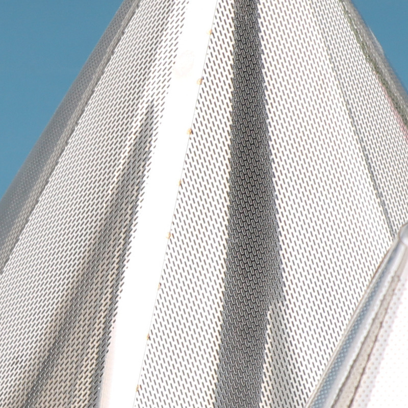 The stainless steel coffee pot filters the funnel.