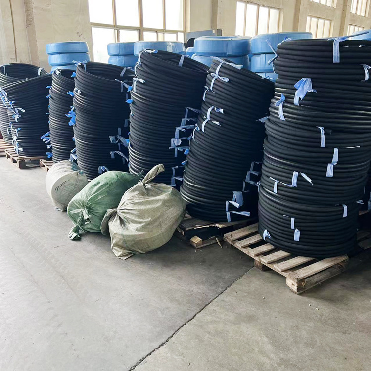 The chemical plant transports hydraulic pneumatic piping for the transport of hydraulic pneumatic fluids into large storage tanks.