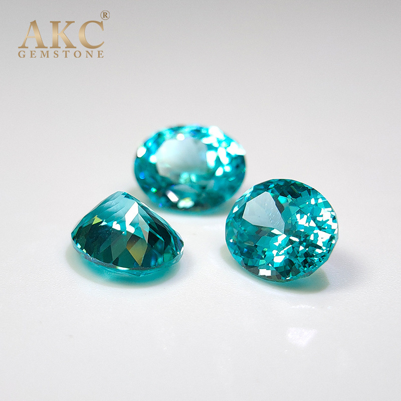 AKC breeds a Palaiba egg-shaped, oval-shaped, blue-lighted, blue-synthetic, electric-supplied stone.