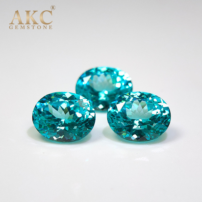 AKC breeds a Palaiba egg-shaped, oval-shaped, blue-lighted, blue-synthetic, electric-supplied stone.