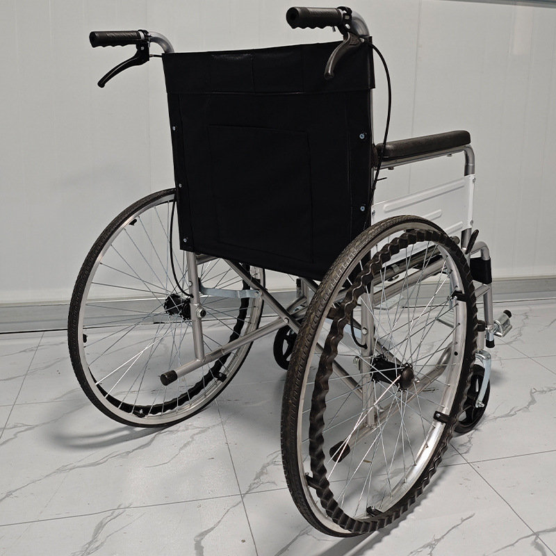 Wholesale folding wheelchairs easily carry disability carts, hand-held wheelchairs for older persons with disabilities