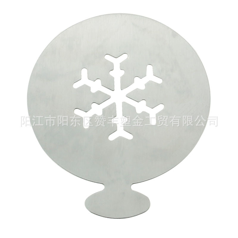 Multiple stainless steel-based coffee molds, six pairs of smiling faces on the cocoa-spray template.