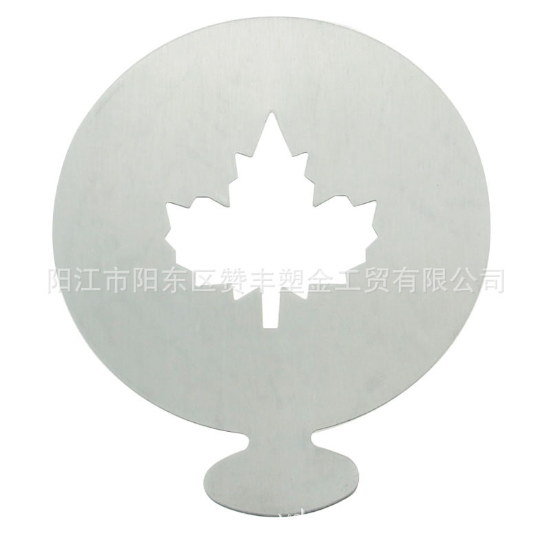 Multiple stainless steel-based coffee molds, six pairs of smiling faces on the cocoa-spray template.