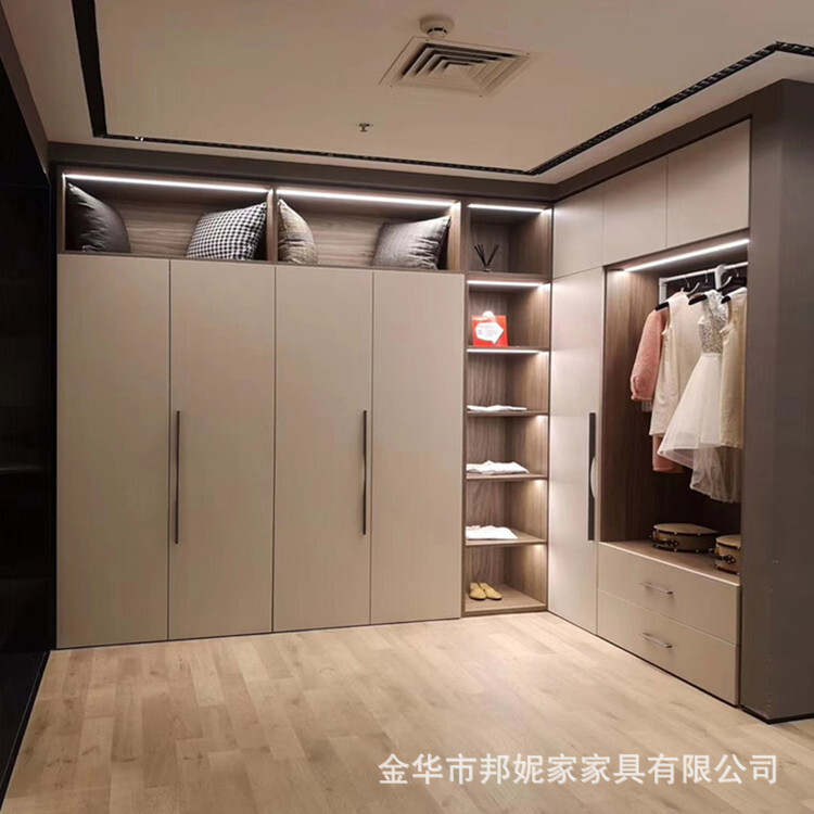 The whole closet is customised to open and walk into the cloakroom.