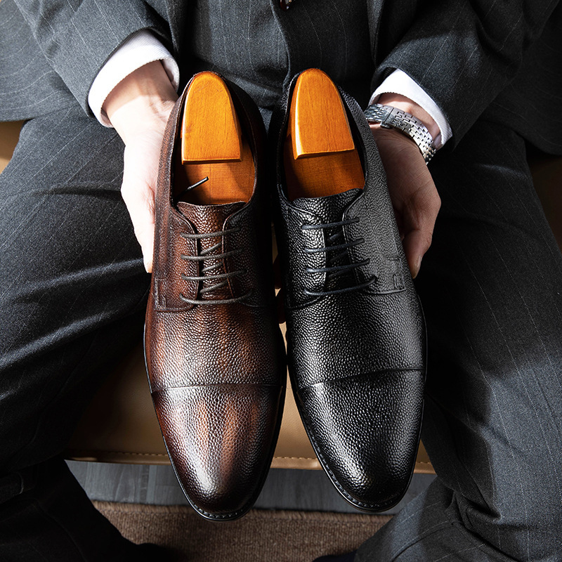 Man's leather shoes are being fitted with English-headed bullskin shoes.