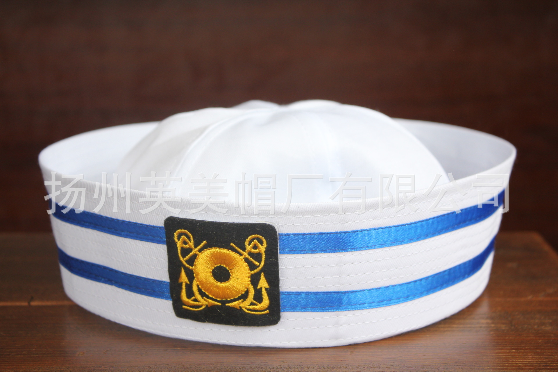 White embroidered sailor hat.