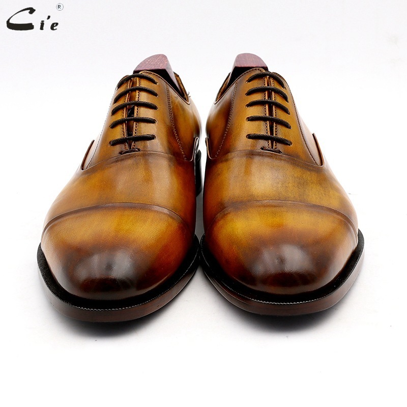 A man's shoe from a hand-made shoe factory who sells the head of a cow's skin, a classic commercial retrofitting business.