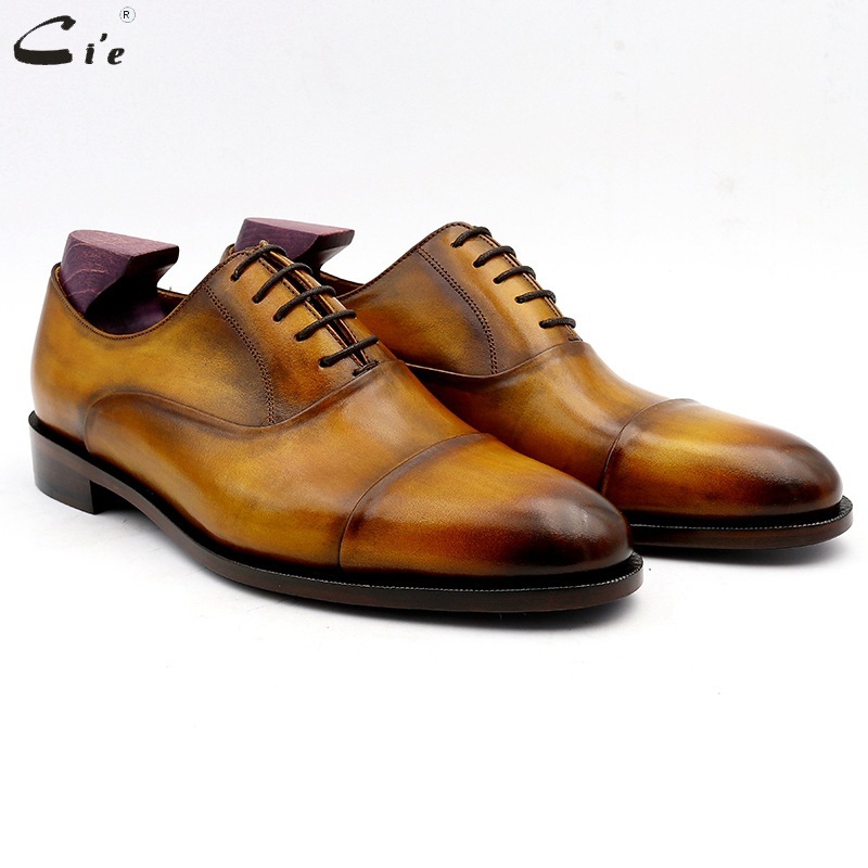 A man's shoe from a hand-made shoe factory who sells the head of a cow's skin, a classic commercial retrofitting business.