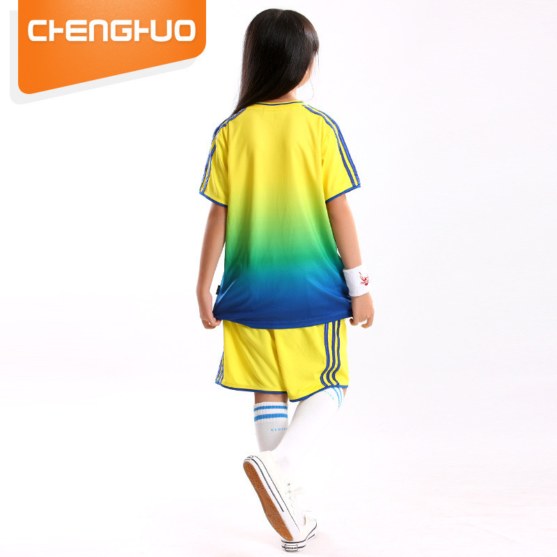 Summer shorts for boys and girls in a sports suit with soccer feathers and pongs