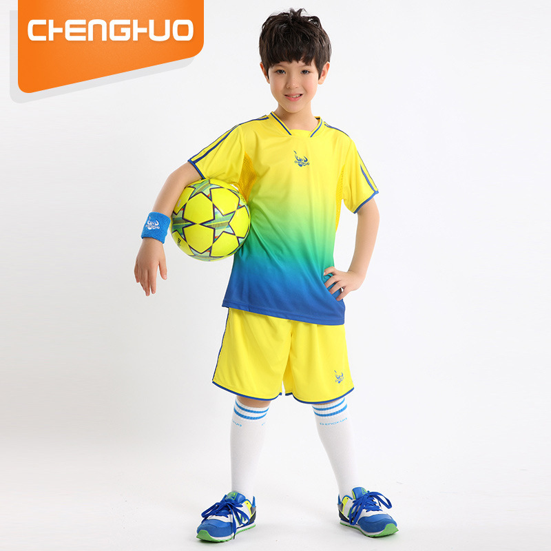 Summer shorts for boys and girls in a sports suit with soccer feathers and pongs