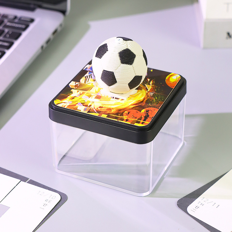 A 360-degree full-scale football model is signed in 3d 3d Creativity in 2025 for the Small Panorama Paper Sculpture Calendar.