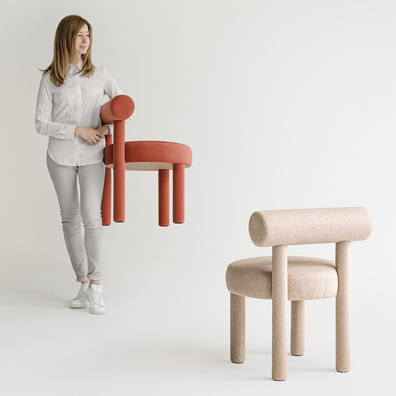 The Danish designer's creamy make-up chair for a girl in the bedroom dresser chair with a make-up seat on her back.