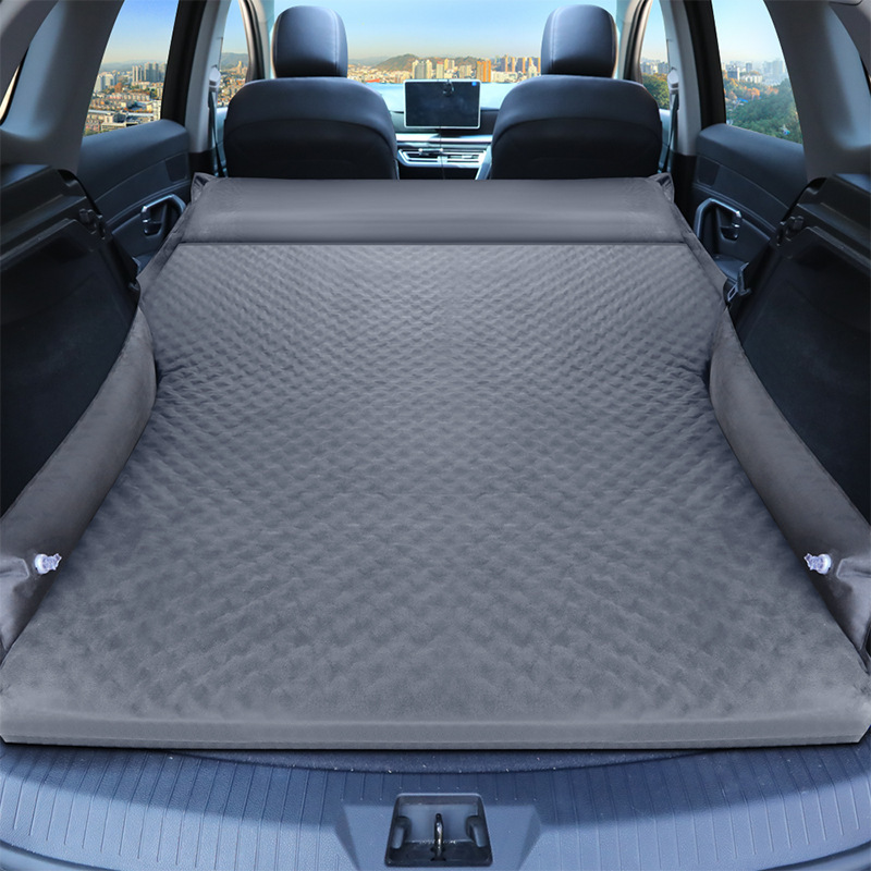 Beds in the trunk of a wholesale car with a pedestal in the back of SUV