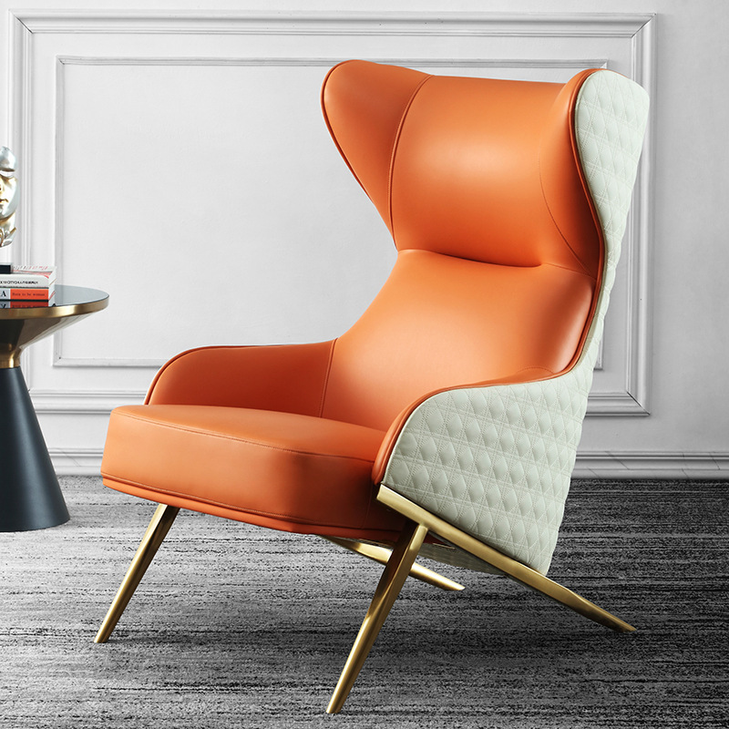 The modern simplistic one-on-one with a high-back couch chair, a tiger chair in the living room of the Leather Designer.