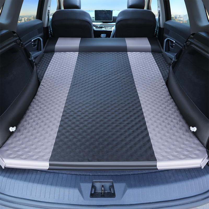 Beds in the trunk of a wholesale car with a pedestal in the back of SUV