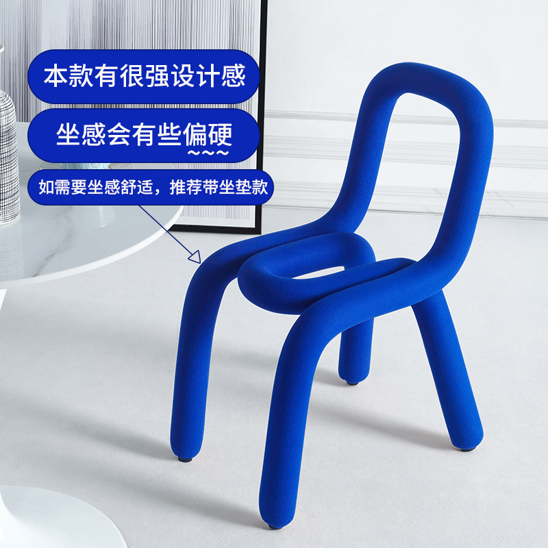 The Klein Blue family used the bedroom dressing table to create the Bold Chair bench designer's recital chair.