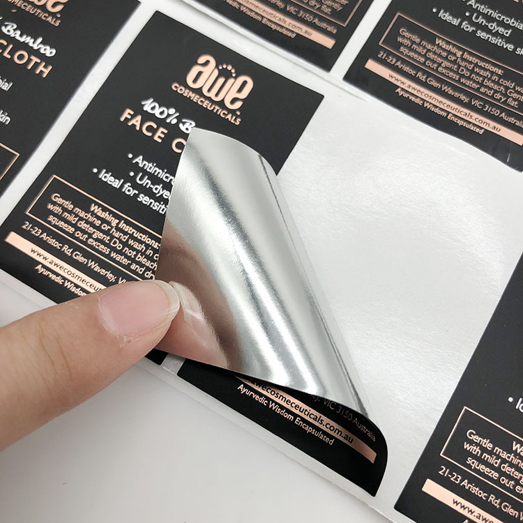 Printed silver and non-dry sticker seals, black tags, ironed, branded.