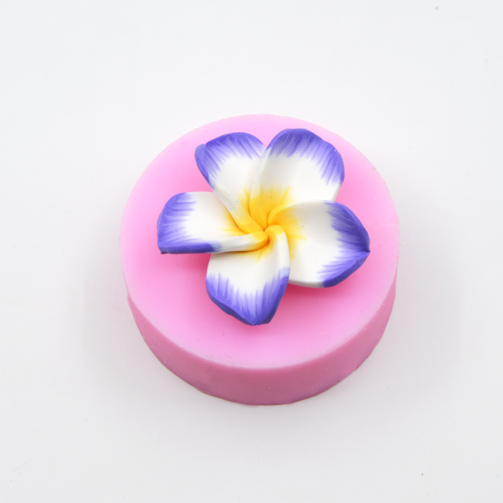 The sugar cake mold, the four-leaved flowers, the sugar silicone mold, the chocolate model F001.