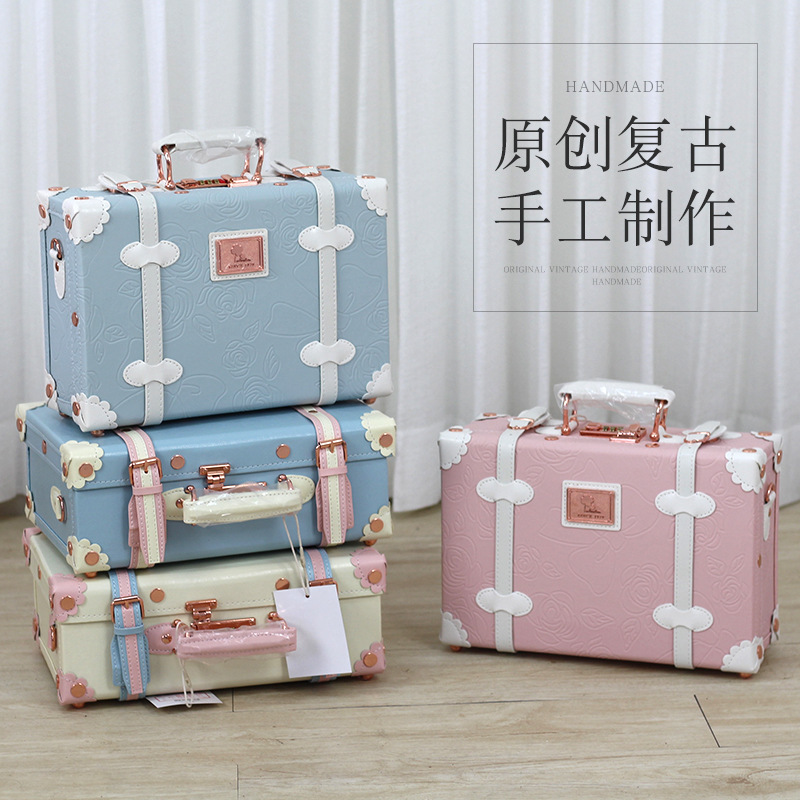 Wholesale of a small suitcase with a small suitcase with a small case of makeup.