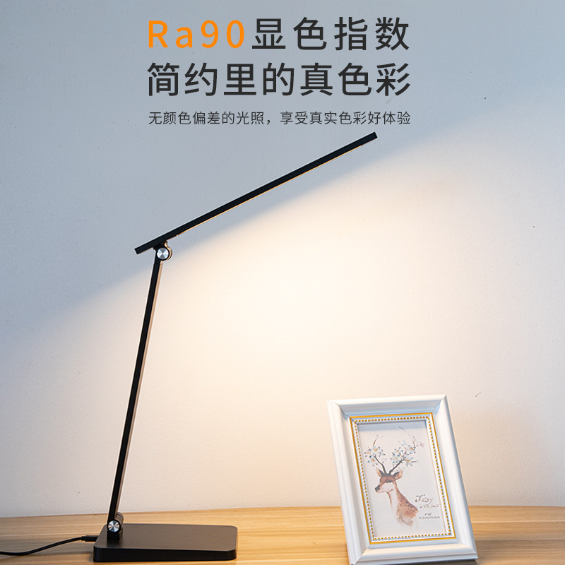 LED charge folds off a read-and-write table lamp, and students learn to write at the head of the desk.