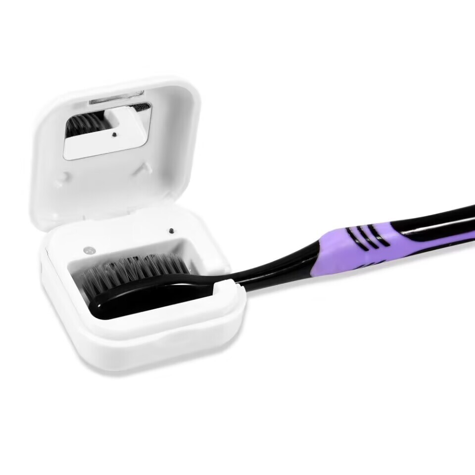 The mini smart toothbrush disinfector charges the portable UV digestive toothbrush box.