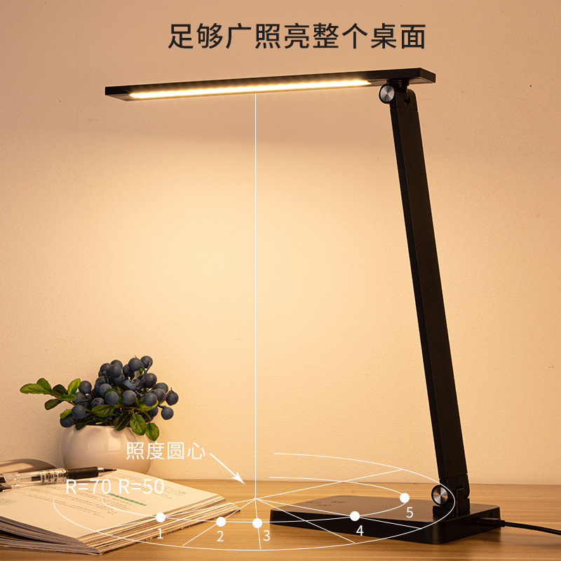 LED charge folds off a read-and-write table lamp, and students learn to write at the head of the desk.