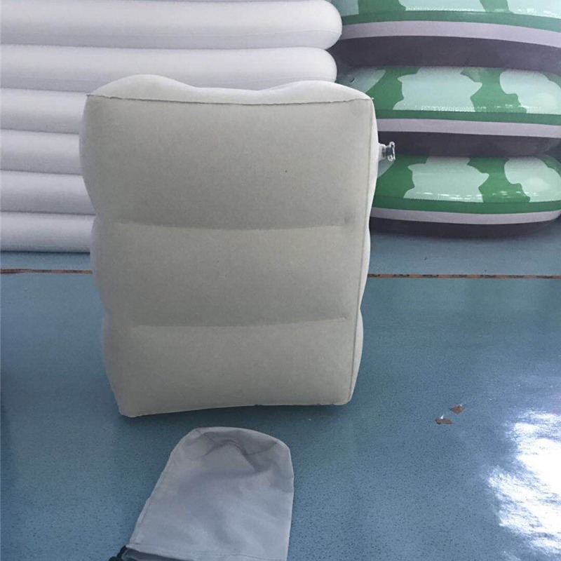 Inflated aircraft foot-stamping a trip outside the country with a leg-stamping train to sleep with a neck pillow and a stool