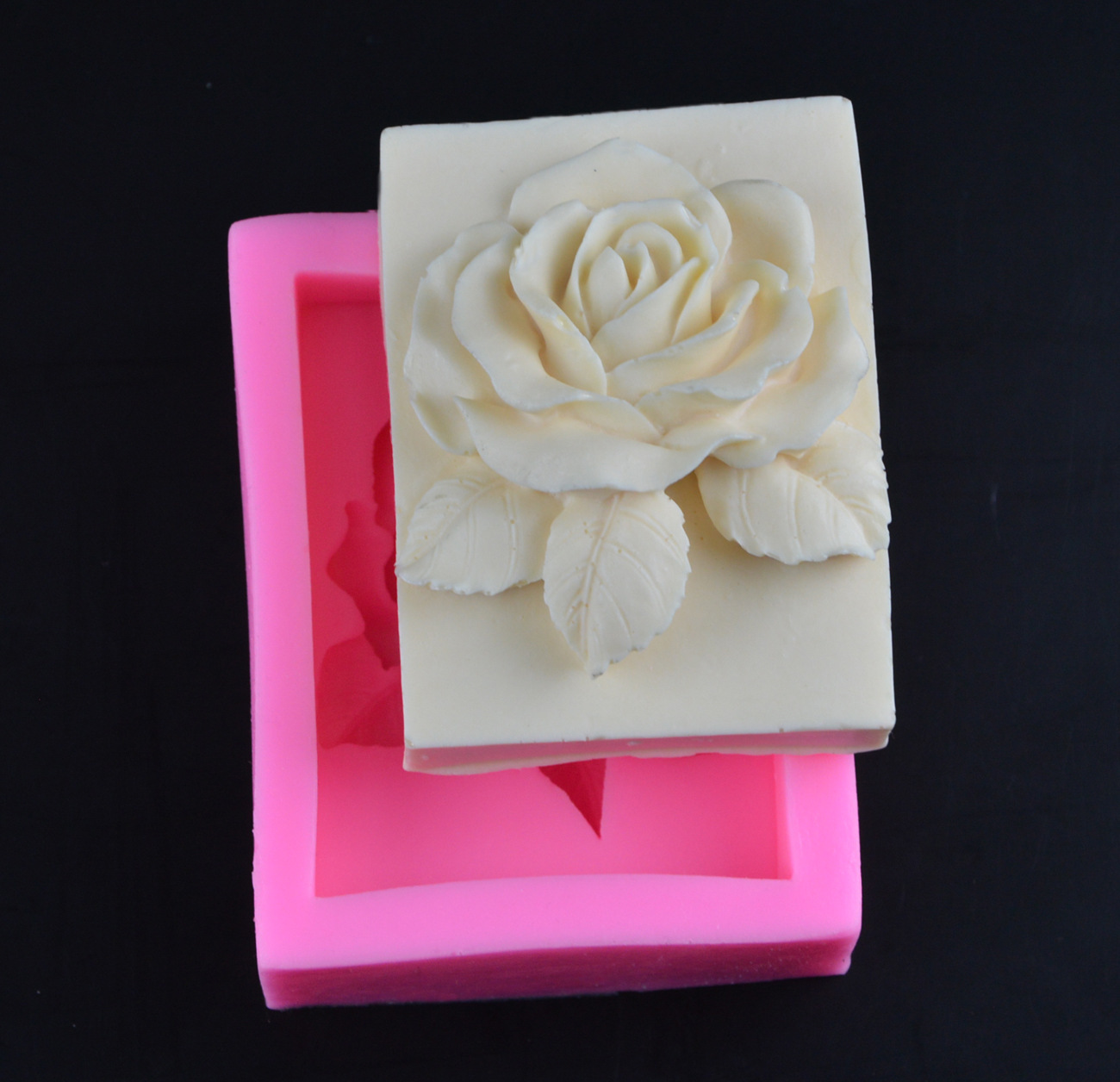 A new silica-geled cake mold, a cold milk-soap model with leaves and roses.