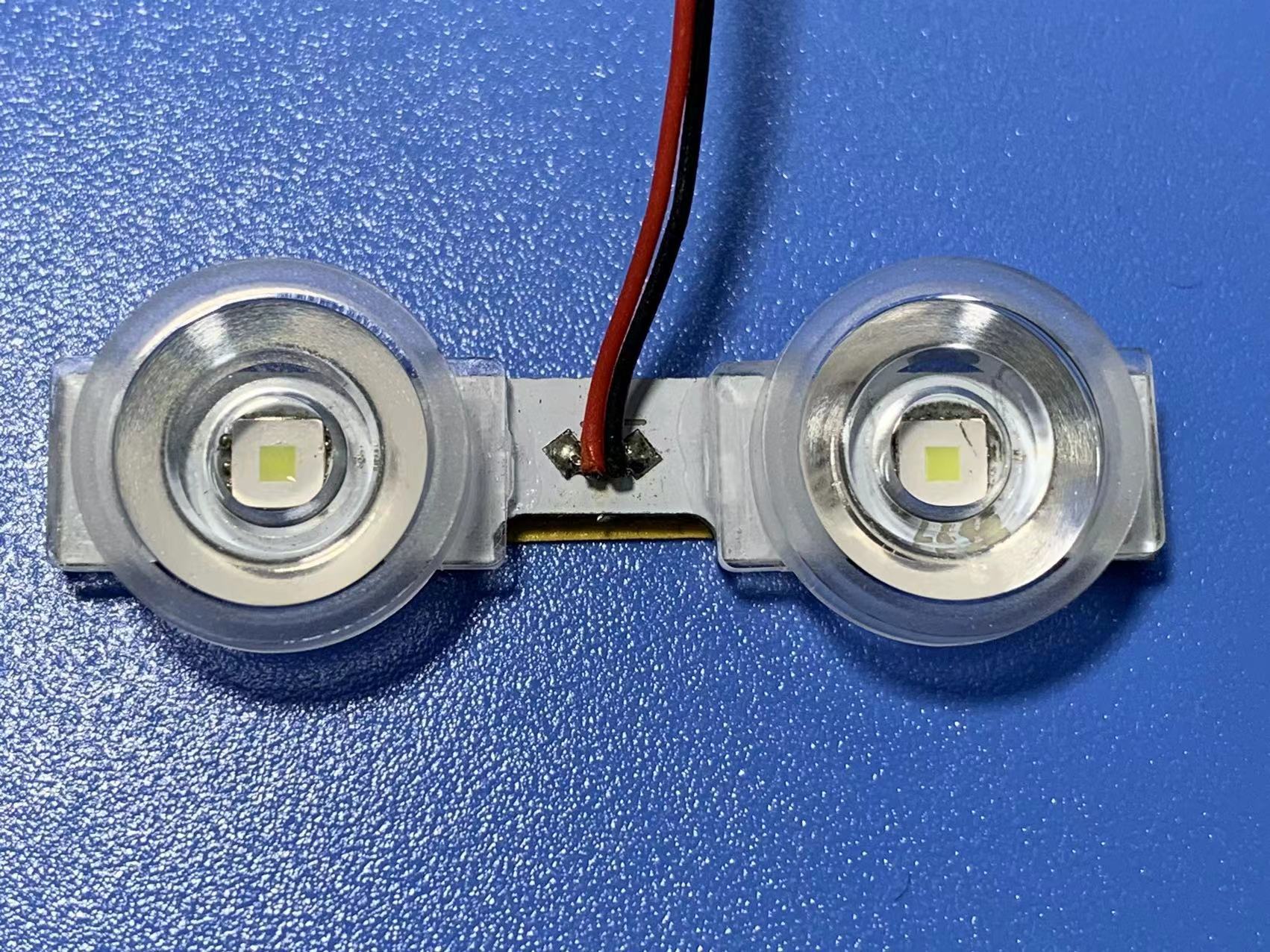 Cellular LED lens lights, single-light components, double-light components