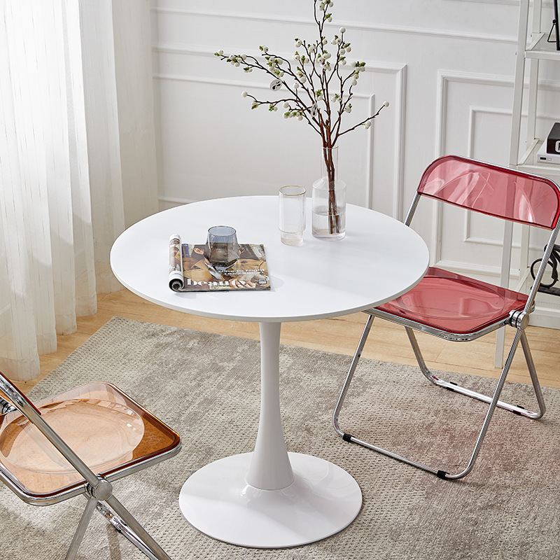 The Nordic Tulip Round table is a modern and simple talk table with coffee and tea and sweets.