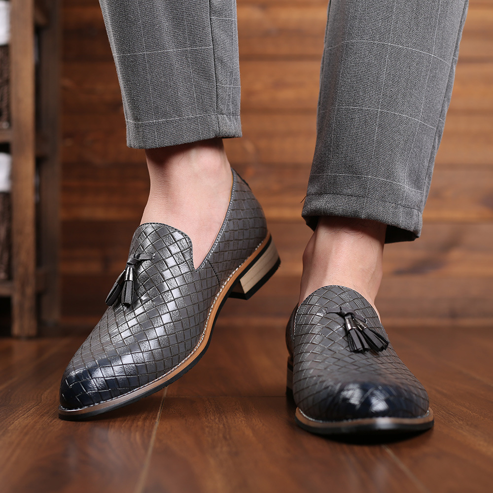 A new man's leisure bean shoe with a big lazy shoe on his sole.
