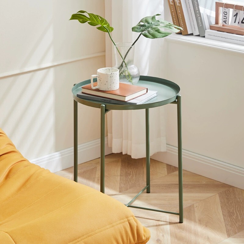 The modern concubine uses a few living room tables on the sofa.