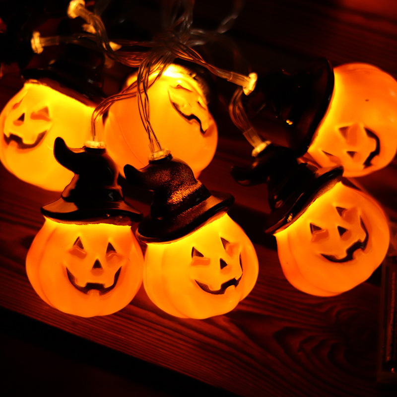 LED Pumpkin with a LED black hat and a pumpkin battery lamp with a Halloween decorator.