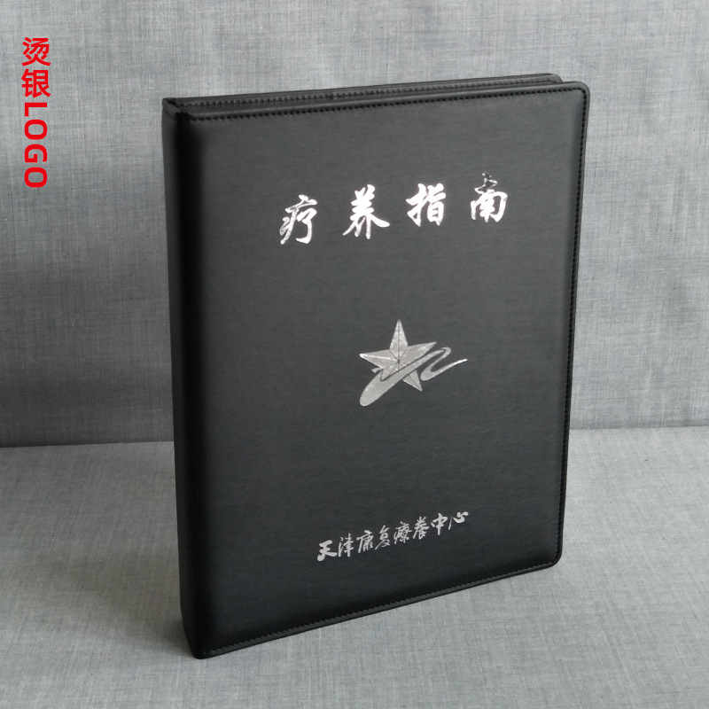 A guidebook for the guest house at the Hotel Vanty with the black PU-skin-leaf shellprint of Logo.