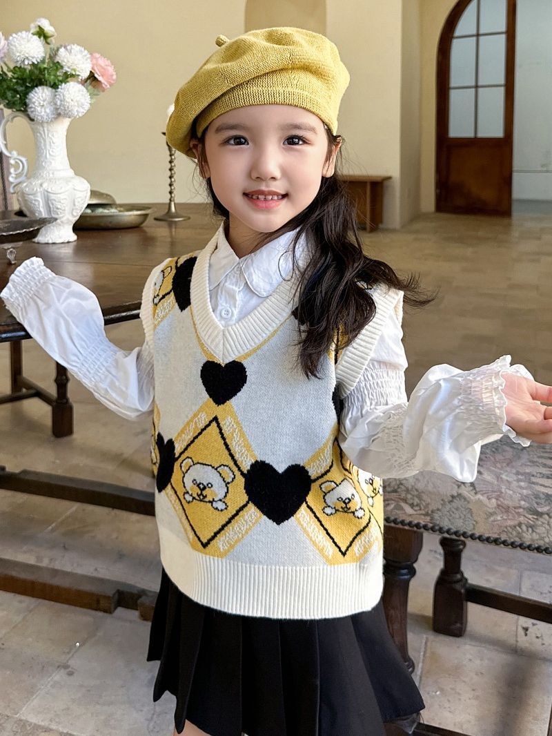 Bộ đồ mới năm 2023 của trẻ em mặc với một cô gái mặc vest kiểu Hàn Quốc đang đan một cái áo sơ sinh hip-hop