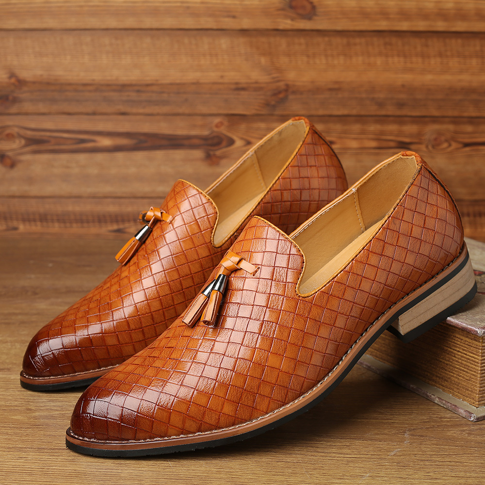 A new man's leisure bean shoe with a big lazy shoe on his sole.