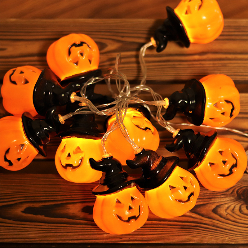 LED Pumpkin with a LED black hat and a pumpkin battery lamp with a Halloween decorator.