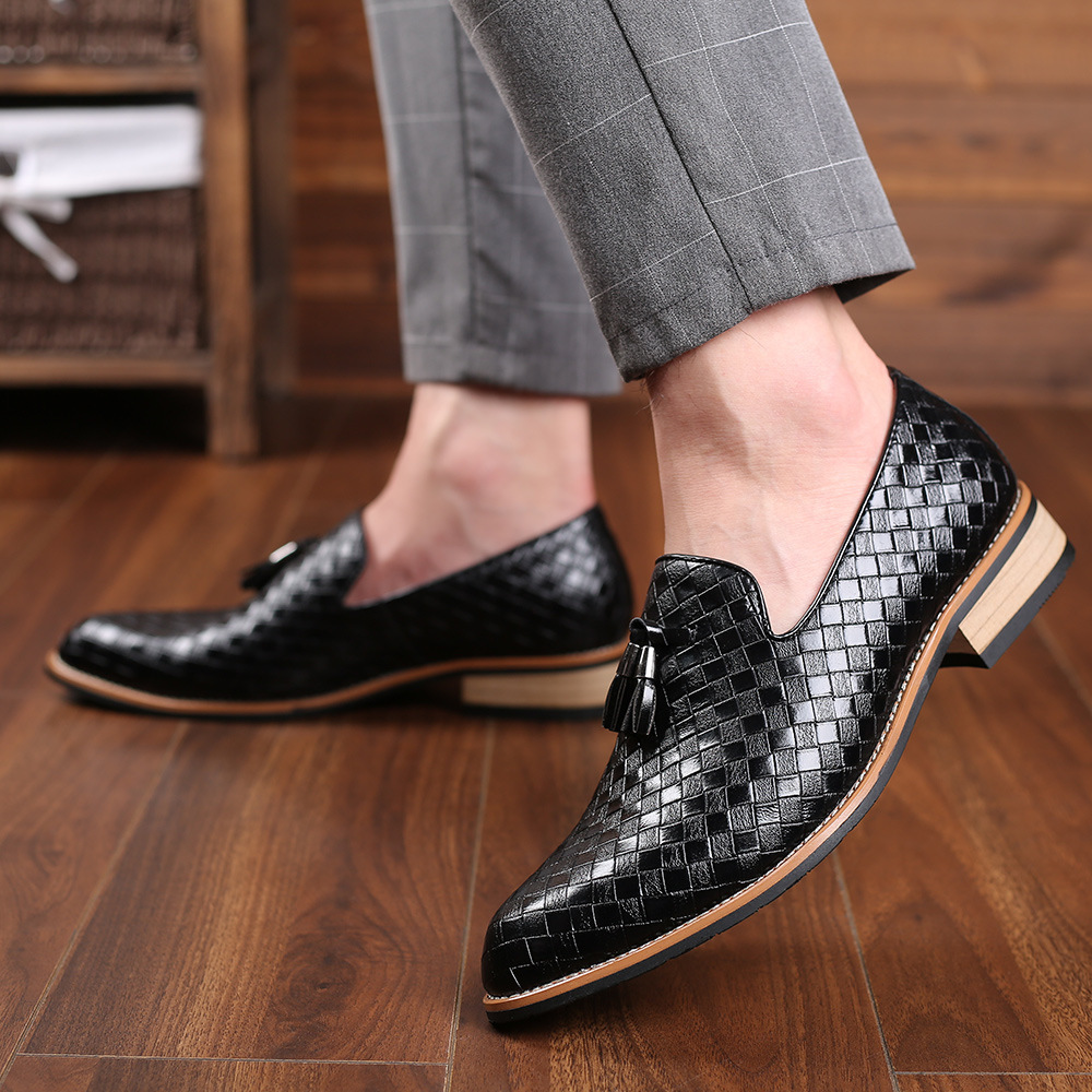 A new man's leisure bean shoe with a big lazy shoe on his sole.