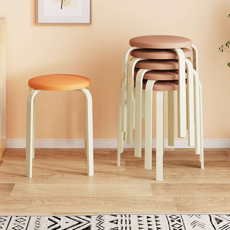 A table bench can fold a stool in a modern, simple stool home with a round stool in a red chair living room.