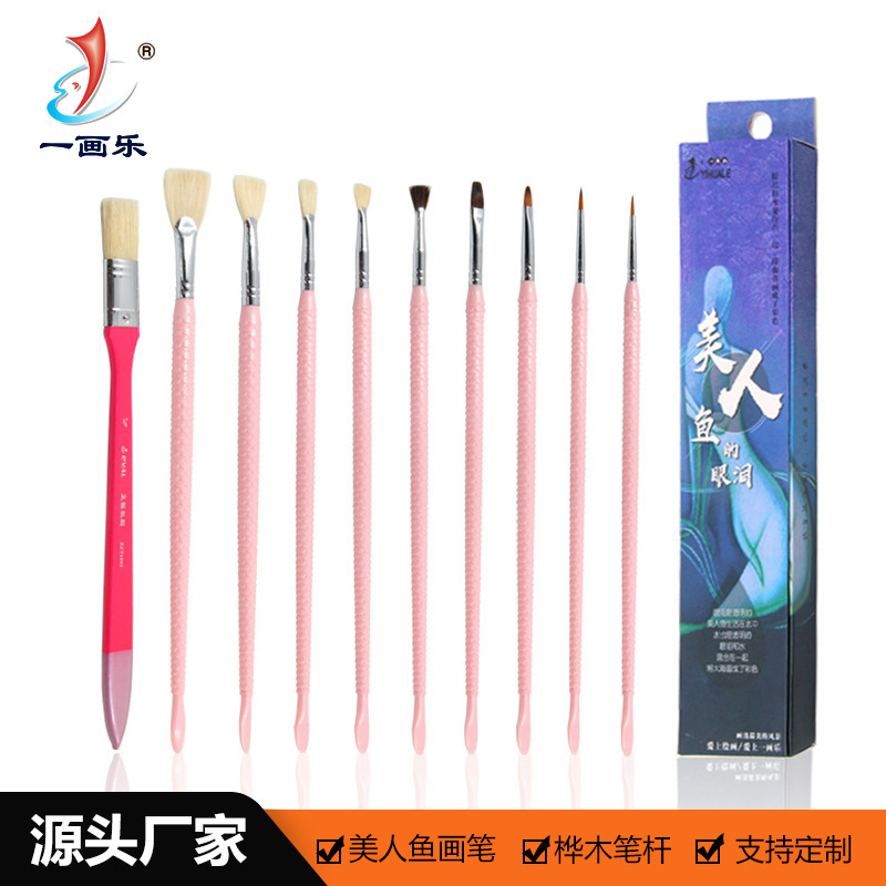 A painting factory customises mermaid plastic rod paint pens.